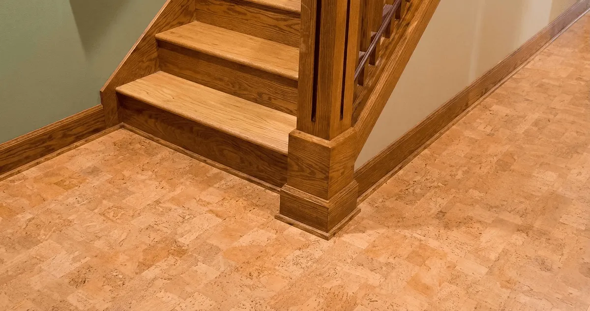 End of a staircase with cork flooring in Albuquerque, NM