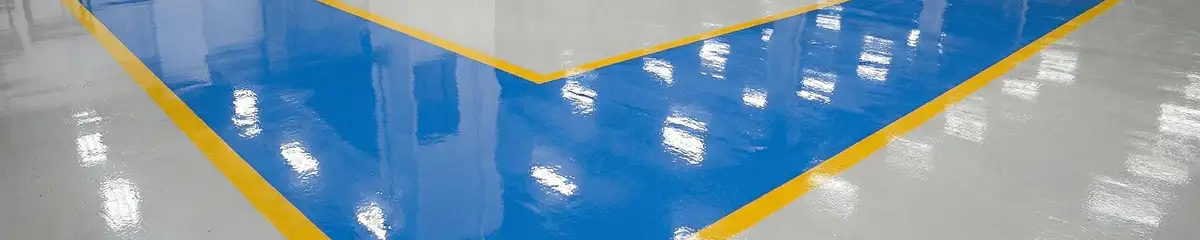 A factory floor professionally covered and marked with epoxy flooring in Albuquerque, NM