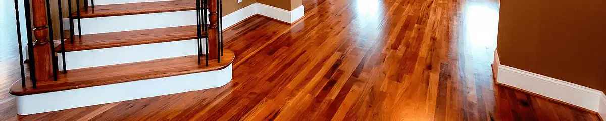 Base floor of a staircase with professionally restored wood flooring in Albuquerque NM