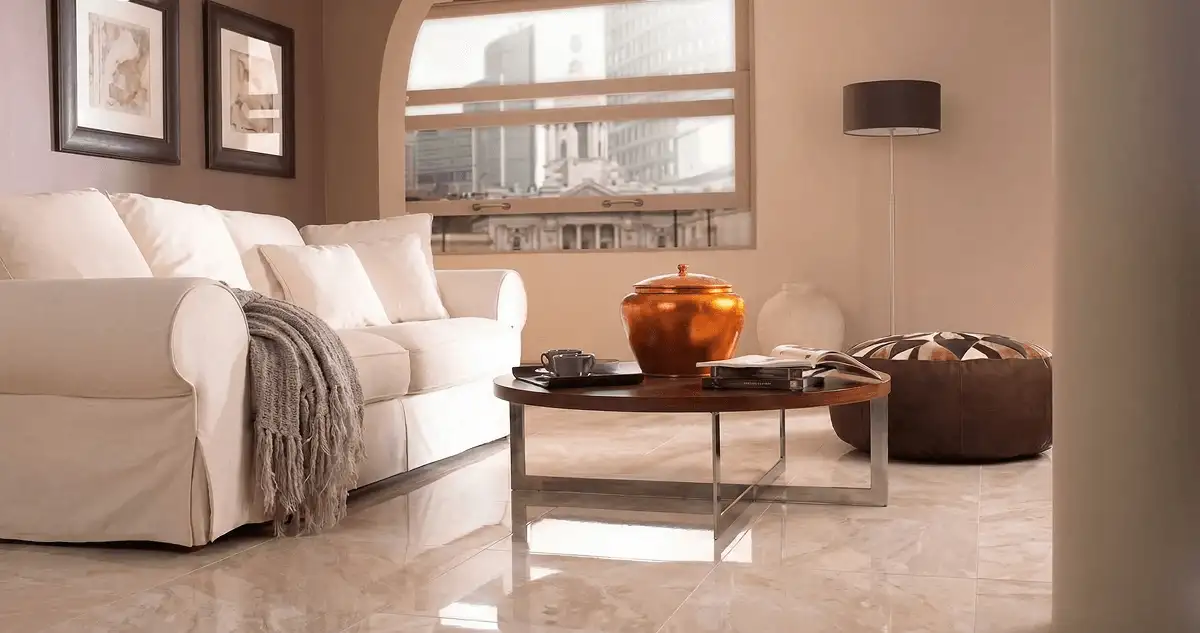 Modern living room with professionally installed marble flooring, a beige sofa, coffee table in Albuquerque, NM
