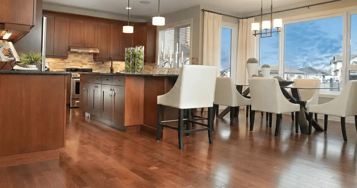 A modern kitchen with professionally installed wood flooring in Albuquerque, NM